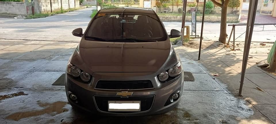 Chevrolet Sonic 1.4 LTZ Hatchback (A) (Category: Used Cars) located in Caloocan City. Submitted by arki_lou.horse (Listing ID 1461415131, Image 1). Description: PTPA: For Sale Chevrolet Sonic LTZ FULL OPTION 2015 Model- HatchBack. Location: Lubao Pampanga ,Slightly Negotiable upon Viewing for Serious Buyers only. -1st Owner, Reason for Selling: Living in Abroad. -Low Mileage- 48,243 km. -1.4 liter Engine, Double overhead cam (DOHC), 16 valve. -6 