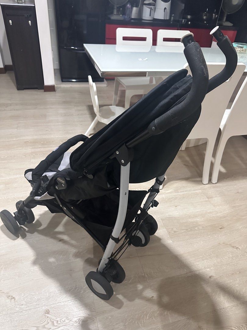 Chicco Stroller (Category: Strollers) located in Singapore. Submitted by abhi29.ec (Listing ID 1461476830, Image 2). Description: - Chicco stroller in black and grey - Lightweight and easy to maneuver - 8 wheels drive - Features a secure 5-point harness - Folds compactly for convenient storage - Ideal for everyday outings.