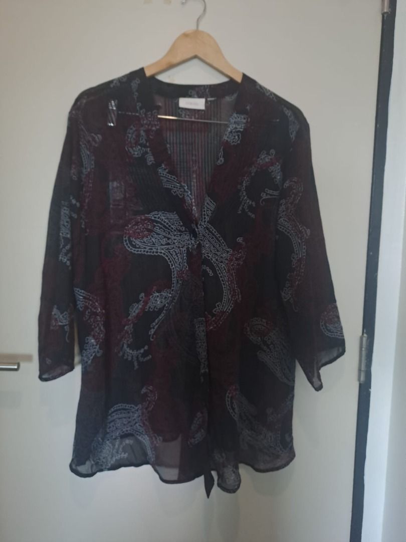 CHICOS COVER UP (Category: Others Tops) located in Mandaluyong City. Submitted by epicowl-c93c (Listing ID 1461430392, Image 1). Description: Chicos paisley print sheer blouse. It features a dark, lightweight georgette or chiffon fabrication detailed with an all-over classic bohemian paisley pattern in shades of deep burgundy, black, and muted grey or beige.