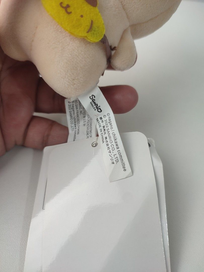 Chiikawa Sanrio Characters Plush Toy Keychain (Category: Plushies & Soft Toys) located in Manila. Submitted by epicmountain-f20453 (Listing ID 1461515202, Image 3). Description: - Adorable Chiikawa plush toy with attached keychain. - Hippers not included. - Includes a handy little pouch on the front. - Comes with a bonus smaller matching bunny charm. - Ideal for decorating bags, backpacks, or as a keychain. - Authentic Sanrio product..