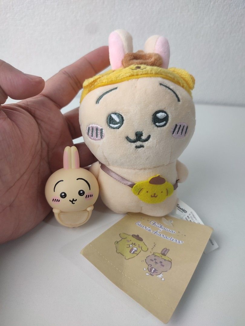 Chiikawa Sanrio Characters Plush Toy Keychain (Category: Plushies & Soft Toys) located in Manila. Submitted by epicmountain-f20453 (Listing ID 1461515202, Image 1). Description: - Adorable Chiikawa plush toy with attached keychain. - Hippers not included. - Includes a handy little pouch on the front. - Comes with a bonus smaller matching bunny charm. - Ideal for decorating bags, backpacks, or as a keychain. - Authentic Sanrio product..