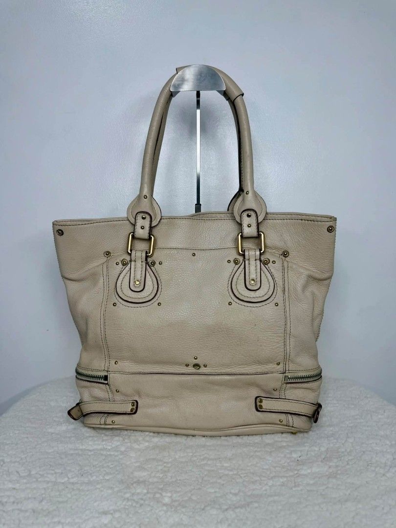 Chloe Paddington Zip Tote Bag (Category: Shoulder Bags) located in Taytay. Submitted by rgun28 (Listing ID 1461486279, Image 3). Description: 🍀 CHLOE PADDINGTON ZIP TOTE BAG🍀 💯% guaranteed original 𝐂𝐨𝐧𝐝𝐢𝐭𝐢𝐨𝐧: In very good used condition/ Rank A-AB. See photos to appreciate.. Money back guaranteed if proven fake by Entrupy. As is where is..NO RETURN!! NO EXCHANGE!! 🔸Before purchasing, please refer to the images for the exact condition