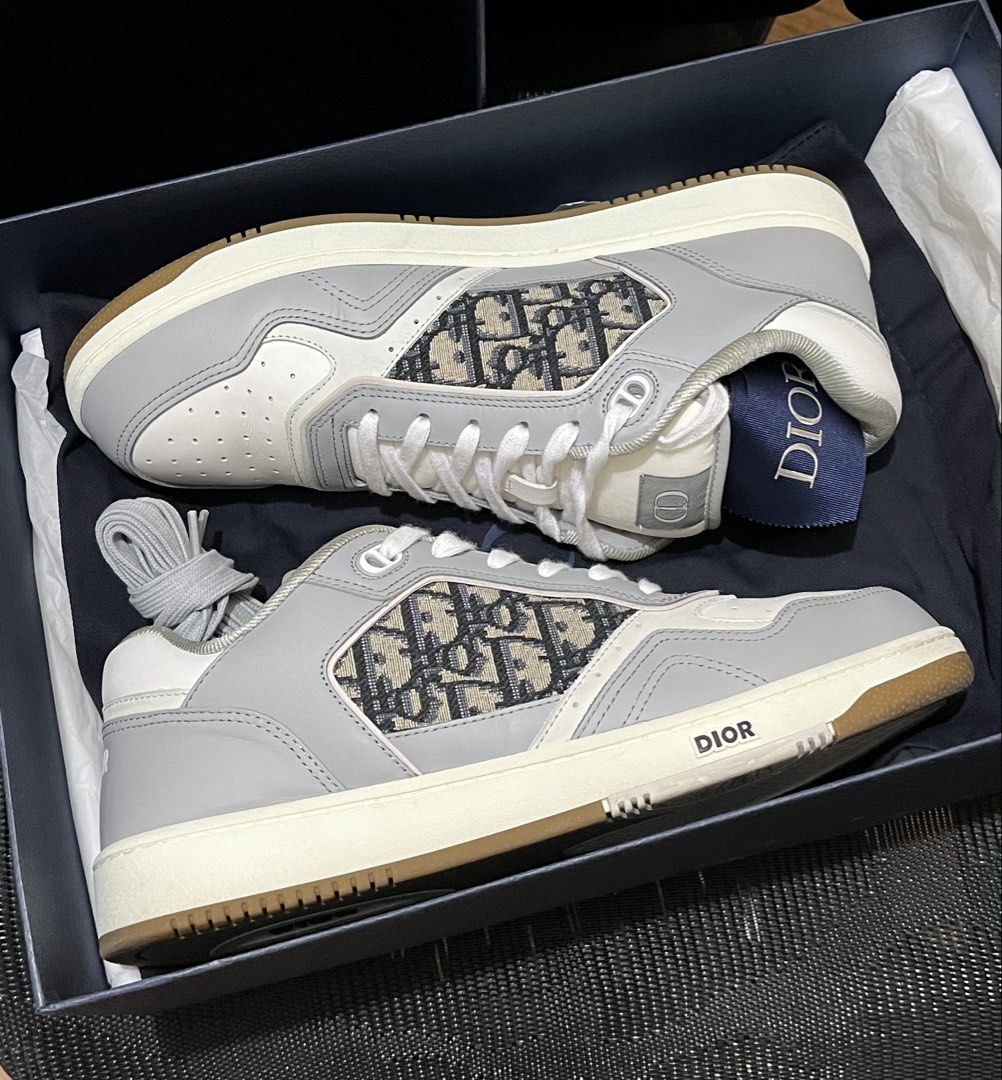 Christian Dior B27 Oblique (Category: Sneakers & Footwear) located in Mandaluyong City. Submitted by pepitomanaloto_777 (Listing ID 1461399179, Image 1). Description: Christian Dior B27 Oblique Worn twice Size: 43.5 (10.5-11us fitting) Inclusion: Dust bag, ribbon, og box & extra grey laces. Price: 27,000 Location Mandaluyong 📍 MOD: Grab/Lalamove/JNT 🚚 MOP: Gcash/Bdo Transfer 💳 No return/Exchange/Refund ❌ No COD/COP Transaction ❌ Need 50% DP fo