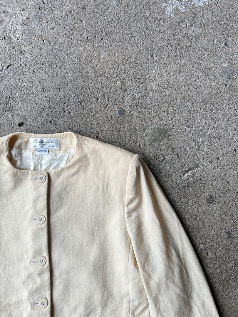 Christian Dior Cream Collarless Blazer (Category: Coats, Jackets and Outerwear) located in Santa Cruz. Submitted by uyaxxxxx (Listing ID 1461456688, Image 3). Description: Christian Dior vintage wool blazer wool jacket minimalist Widht-19 Lenght-23 colorate 10/10 issue-nasa last pic gasgas Goodcondition pm more details! 📩.