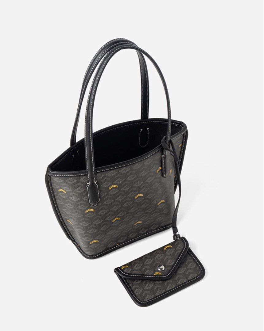 CHRISTY NG | MINI RUSSO TOTE BAG SECOND EDITION (BLACK) (Category: Tote Bags) located in Antipolo. Submitted by shopsteffi (Listing ID 1461404666, Image 3). Description: Price negotiable! ORIGINAL PRICE: ₱2599 Used twice only while travelling. Good as brandnew Christy Ng’s Russo Mini Tote Bag (2nd edition) is refreshed with this season’s cubic garden monogram print. The cuboidal monogram of the brand’s C.N. initials are modernized with sharper, i