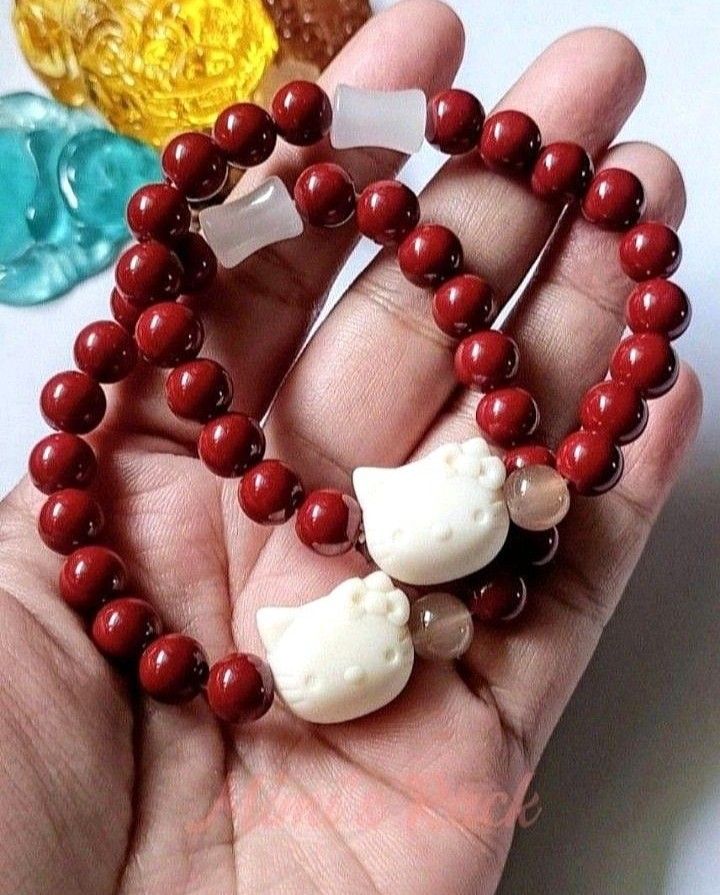CINNABAR AND WHITE CHALCEDONY WITH HELLO KITTY CHARM (Category: Bracelets) located in Taguig. Submitted by mimisrack (Listing ID 1461559181, Image 3). Description: ❤️Sweet protection energy with a cute, joyful charm for everyday luck and positivity -Cinnabar is known in feng shui traditions as a stone of protection, wealth attraction, and powerful life-force energy -White Chalcedony promotes calm emotions, gentle healing, and peaceful communicati