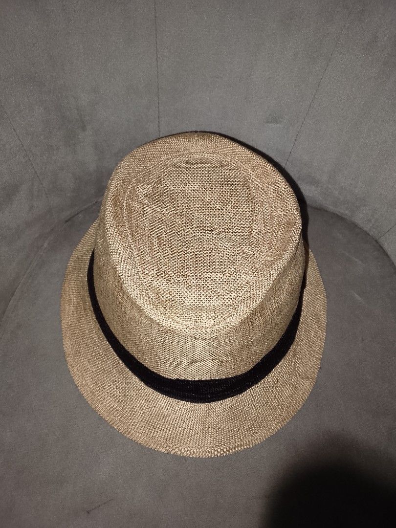 Classic Straw Fedora Hat with Black Band (Category: Caps & Hats) located in Binangonan. Submitted by yuristalin888 (Listing ID 1461379051, Image 3). Description: Upgrade your warm-weather style with this timeless straw fedora, designed for both comfort and effortless sophistication. Featuring a tightly woven, breathable natural straw construction and a contrasting black ribbon band, this lightweight hat offers dependable sun protection while keep
