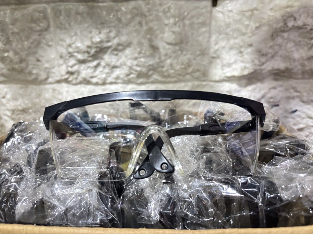 Clear Safety Glasses with Black Frame (Category: Sunglasses & Eyewear) located in Manila. Submitted by rosel2001 (Listing ID 1461411997, Image 1). Description: - Clear lens protective eyewear - Durable black frame - Designed for maximum eye safety - Comfortable fit for extended wear - Ideal for various tasks requiring eye protection - Get yours today!.