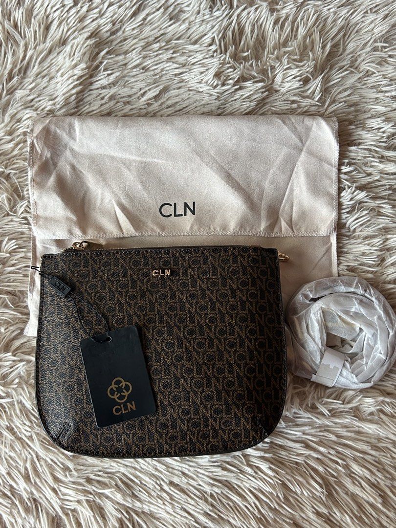 CLN Monogram Pouch Bag with Dust Bag and Strap (Category: Luxury Bags & Wallets) located in Caloocan City. Submitted by mireya_ (Listing ID 1461351506, Image 1). Description: - Brand new CLN monogram pouch bag/ Body Bag - Comes with original tag attached - Includes dust bag - Detachable strap included - Elegant gold hardware details - Secure zipped closure .