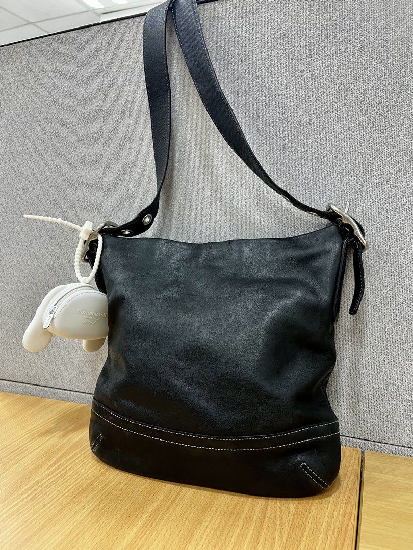 Coach Black Leather Hobo Shoulder Bag (Category: Luxury Bags & Wallets) located in Pasig City. Submitted by zen_it_all (Listing ID 1461368883, Image 3). Description: - Authentic leather Coach hobo bag - Elegant white stitching details - Convenient front zip pocket - Secure main zip closure - Adjustable shoulder strap for comfort - charm not included - Ideal everyday bag. / can be unisex - flaws: upper lip portion / zipper puller (but overall cond