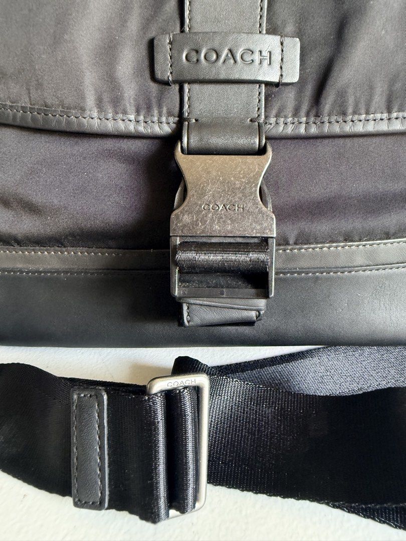 Coach Black Nylon Leather Messenger Bag (Category: Luxury Bags & Wallets) located in Valenzuela. Submitted by dees.corner (Listing ID 1461425412, Image 2). Description: - Authentic Coach messenger bag - Durable nylon material with stylish leather trim - Secure buckle closure on the front flap - Adjustable shoulder strap for comfortable carrying - Includes original leather Coach tag - Ideal for everyday errands or travel adventures Coach Mens Blac