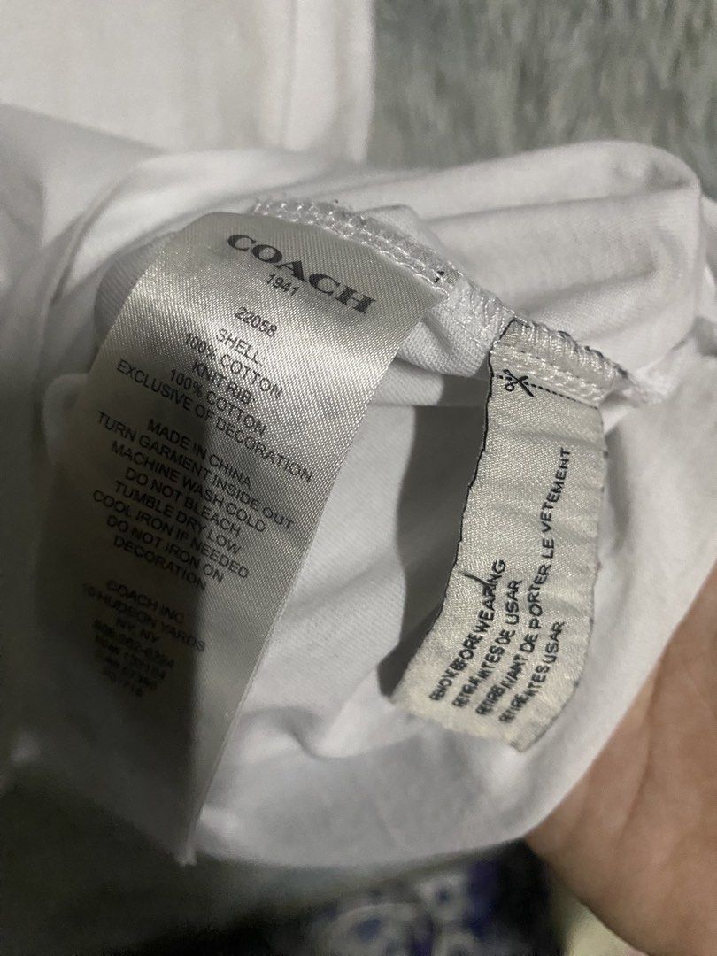 COACH DINOSAUR (Category: Tshirts & Polo Shirts ) located in Cavite. Submitted by sammie_jhane (Listing ID 1461527837, Image 3). Description: COACH DINOSAUR COMPLETE TAGS GOOD CONDITION/YELLOW STAIN,1 VERY MINIMAL REPAIR HOLE DIMES WIDTH 18.5-19 LENGTH 26 🏷️299+SHIPPING FEE DASMARIÑAS CAVITE LOC.