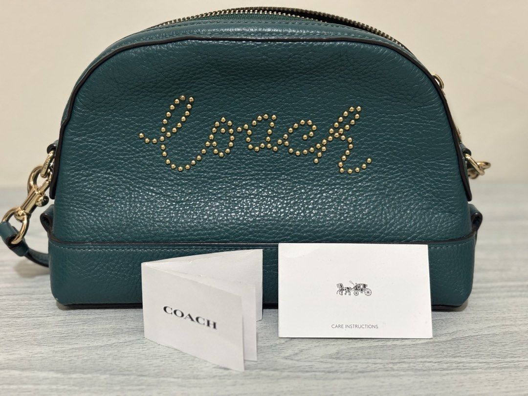 Coach Dome Crossbody with Studded Coach Script (Category: Luxury Bags & Wallets) located in Virac. Submitted by y0mimi (Listing ID 1461387047, Image 2). Description: - 100% authentic or money back - In good condition MOP: Gcash / BDO Courier: J&T / LBC (sf paid by buyer) Location: Bicol 💌Dm for offers.