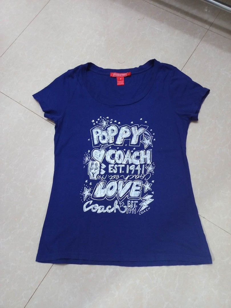 Coach Poppy Vintage Tshirt (Category: Luxury Apparel) located in San Fernando. Submitted by avylll_thrift (Listing ID 1461338090, Image 1). Description: Coach Poppy Vintage Tshirt Deep Blue color in actual little crack print overall: 8/10.