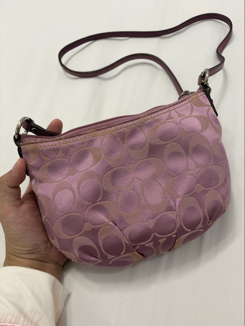 Coach Purple / Pink Monogram Shoulder Bag (Category: Luxury Bags & Wallets) located in Manila. Submitted by cb_curations (Listing ID 1461460253, Image 3). Description: RARE COLOR!! - Vintage purple-pink Coach shoulder bag - Signature C monogram pattern - Top zipper closure - Small exterior zip pocket - Interior zip pocket - Ideal for everyday use With minimal chips on leather (see closer pics).