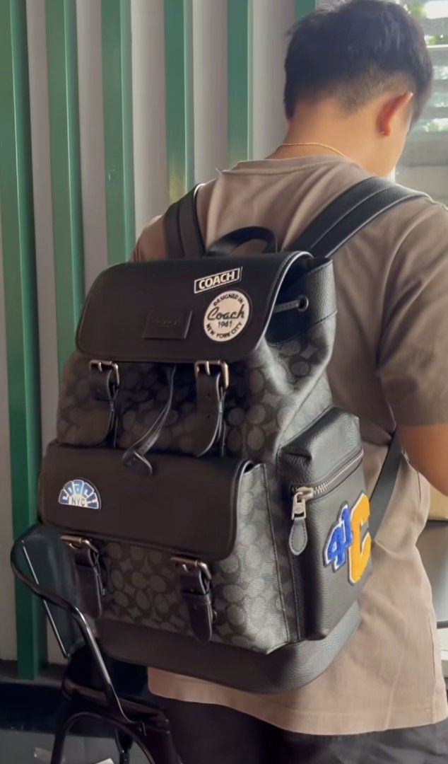 Coach Sprint Backpack Vietnam Made (Category: Backpacks) located in Las Pinas. Submitted by luxlahvu2017 (Listing ID 1461431342, Image 2). Description: - Signature Coach print all over - Fun NYC patch on the front pocket - '4C' patch on the side - Drawstring closure under a flap with buckle straps - Ideal for everyday use or travel.