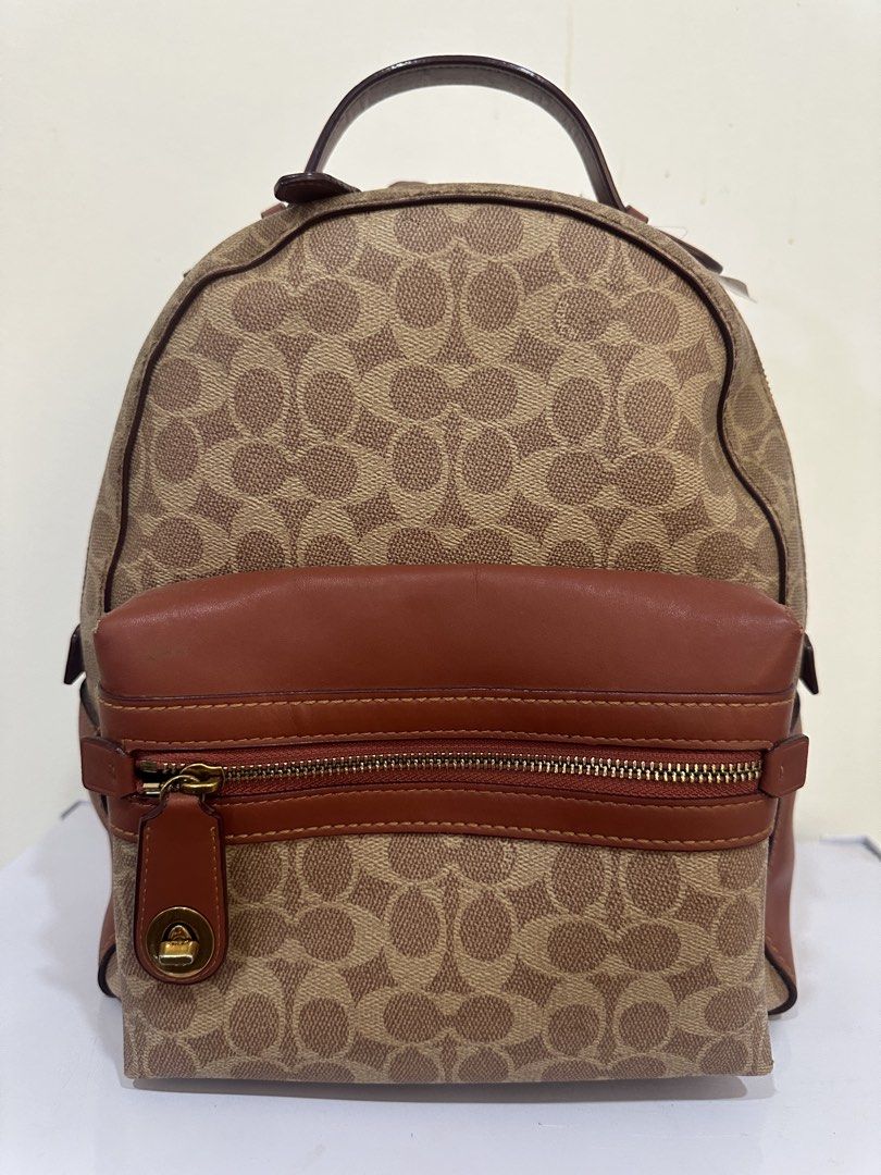 Coach x Disney Monogram Canvas Leather Backpack (Category: Backpacks) located in Malabon City. Submitted by everythingpreloveddd (Listing ID 1461375899, Image 1). Description: - Coach x Disney collaboration backpack - Signature monogram canvas with brown leather trim - Adjustable shoulder straps - Front zip pocket - Top handle - Ideal for everyday essentials - Shows minimal signs of wear.