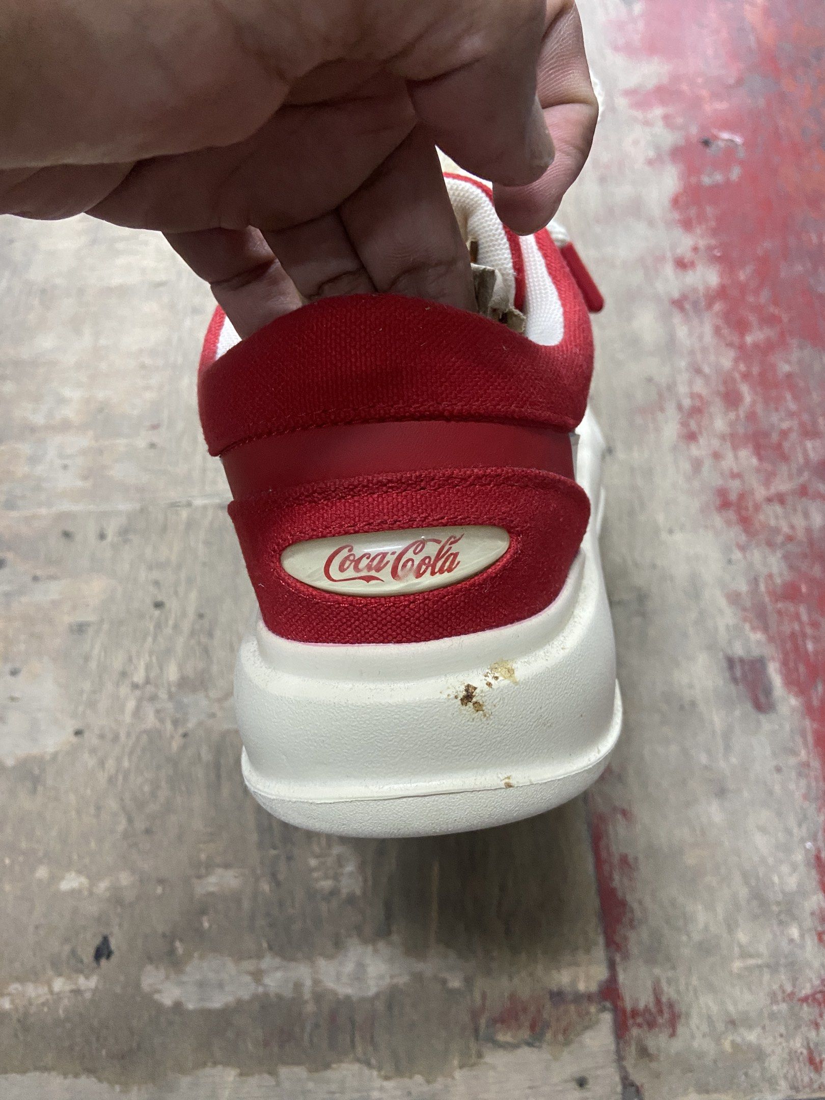 Coca-Cola Red Canvas Sneakers (Category: Sneakers) located in Pilar. Submitted by romeoabejo54125 (Listing ID 1461503193, Image 2). Description: - Red Coca-Cola canvas sneakers - White laces and sole - Size: US 7 (UK 6.5, EU 39) - Condition: Minor marks on heel area - Ideal for casual wear - Unique and stylish kicks!.