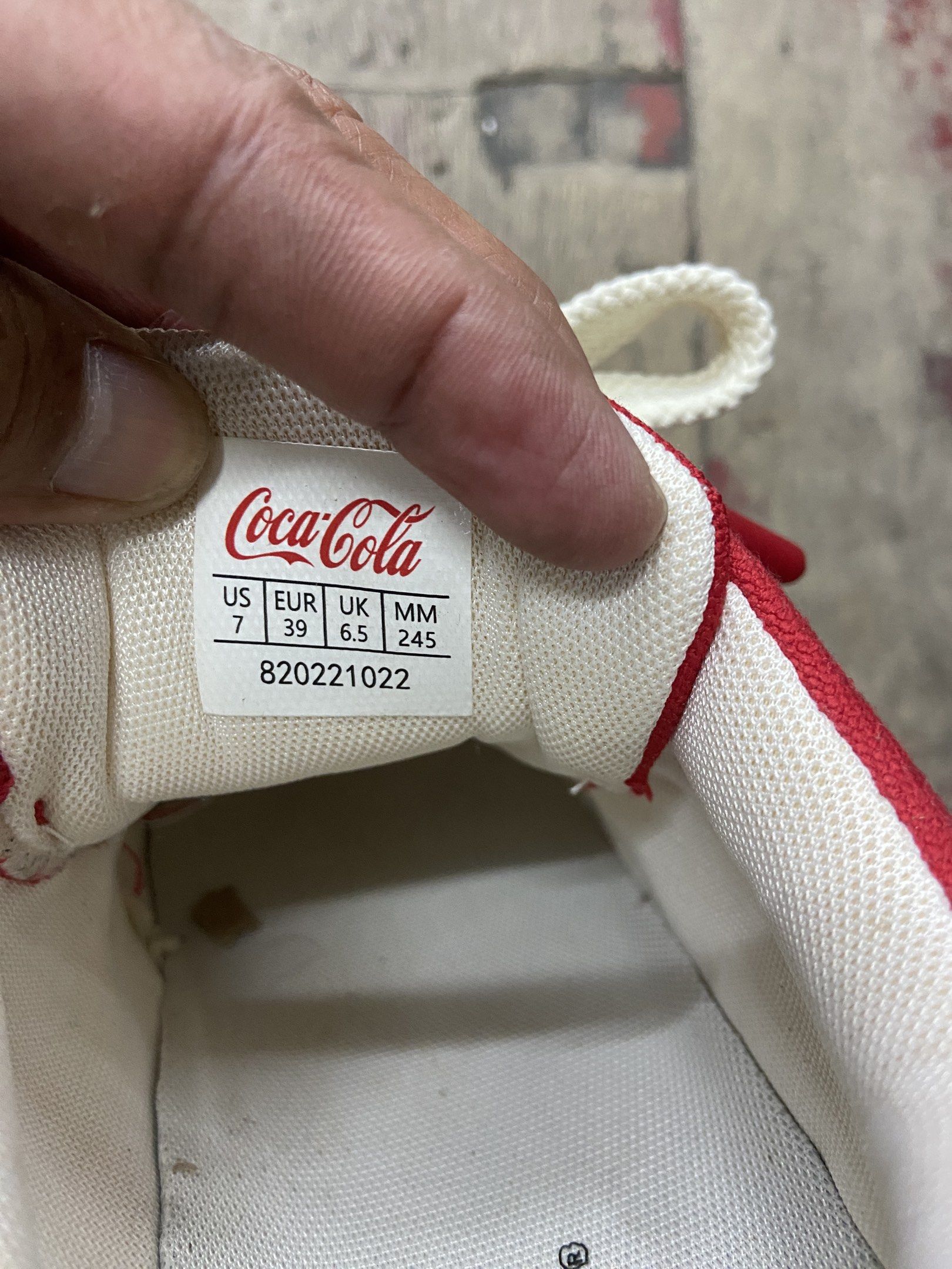 Coca-Cola Red Canvas Sneakers (Category: Sneakers) located in Pilar. Submitted by romeoabejo54125 (Listing ID 1461503193, Image 3). Description: - Red Coca-Cola canvas sneakers - White laces and sole - Size: US 7 (UK 6.5, EU 39) - Condition: Minor marks on heel area - Ideal for casual wear - Unique and stylish kicks!.