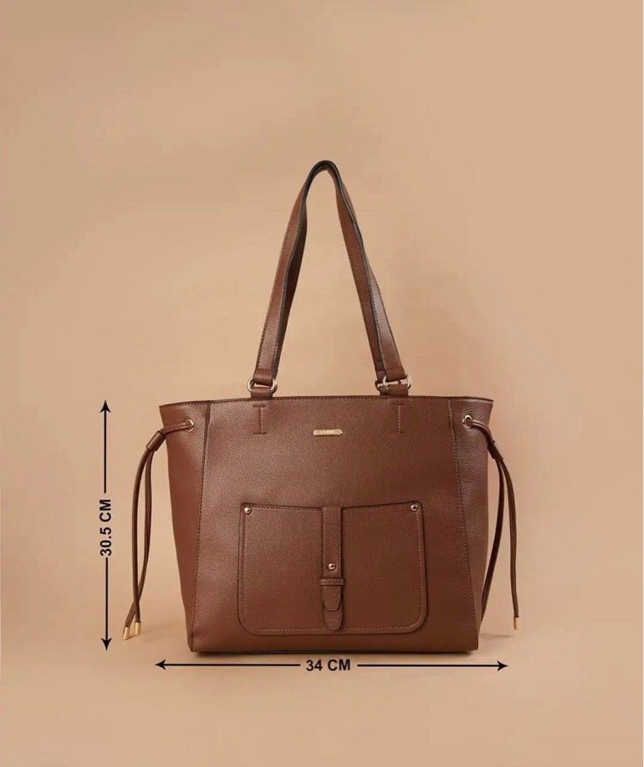 Code by lifestyle UAE BRAND brown shoulder bag (Category: Shoulder Bags) located in Mandaluyong City. Submitted by splashfashion.ph (Listing ID 1461336555, Image 2). Description: .