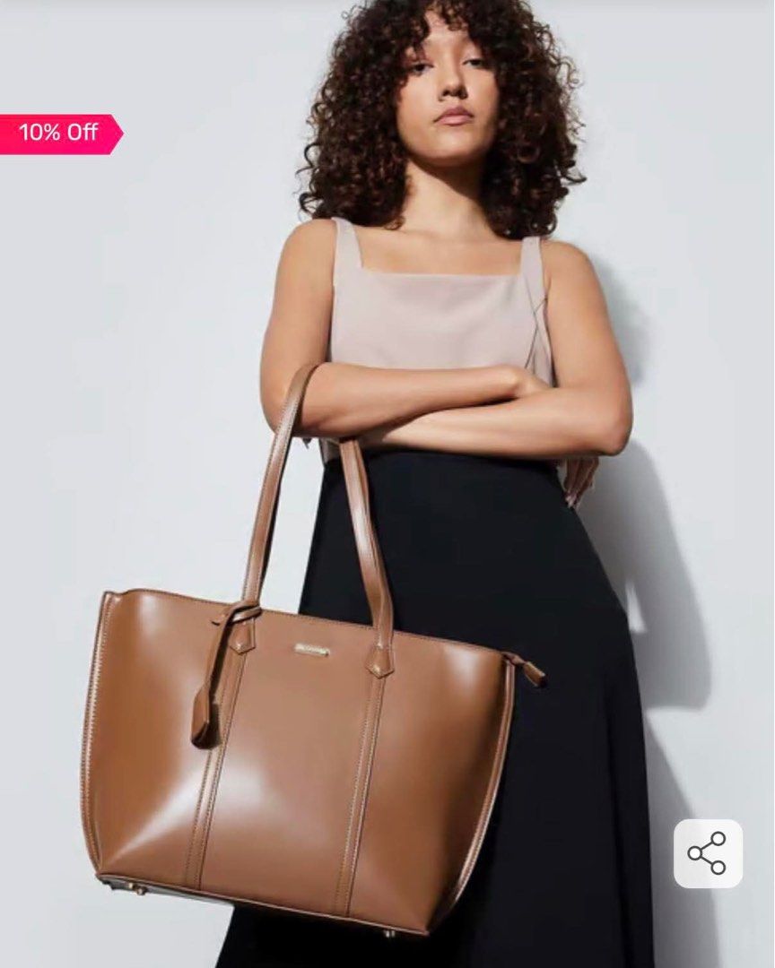 Code by lifestyle UAE brand brown shoulder bag (Category: Shoulder Bags) located in Mandaluyong City. Submitted by splashfashion.ph (Listing ID 1461337035, Image 1). Description: .