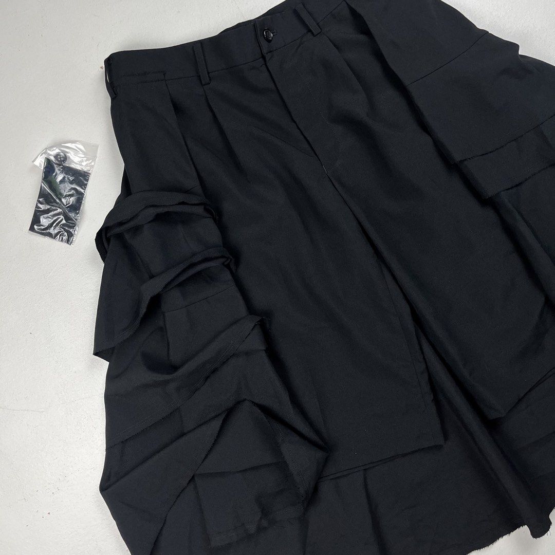 Comme des Garçons SS2017 Tiered Ruffled Skort Shorts (Category: Luxury Apparel) located in Quezon City. Submitted by forgarments (Listing ID 1461401078, Image 2). Description: Comme des Garçons SS2017 Tiered Ruffled Skort Shorts Excellent Condition with extra buttons & Fabric sample - Has a few Pin holes at the back tiered ruffle Size: small Waist: 29 inches Front rise: 10 inches Inseam: 12.5 inches Thigh: 12.5 inches Hem: 11 inches Short length: