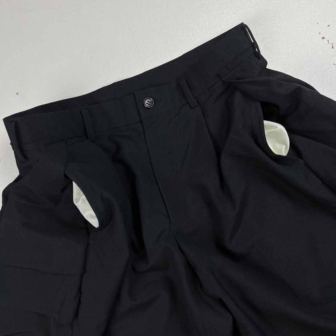 Comme des Garçons SS2017 Tiered Ruffled Skort Shorts (Category: Luxury Apparel) located in Quezon City. Submitted by forgarments (Listing ID 1461401078, Image 3). Description: Comme des Garçons SS2017 Tiered Ruffled Skort Shorts Excellent Condition with extra buttons & Fabric sample - Has a few Pin holes at the back tiered ruffle Size: small Waist: 29 inches Front rise: 10 inches Inseam: 12.5 inches Thigh: 12.5 inches Hem: 11 inches Short length: