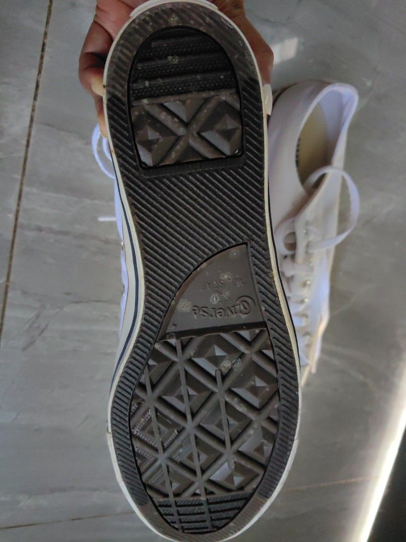Converse (Category: Sneakers & Footwear) located in Quezon City. Submitted by flat.earther23 (Listing ID 1461341830, Image 3). Description: - ORIGINAL Classic white Converse low tops - Canvas material - Red and blue stripe detail on the sole - White laces - Soles show some wear but have plenty of grip - Perfect for everyday wear and easy to pair with any outfit.