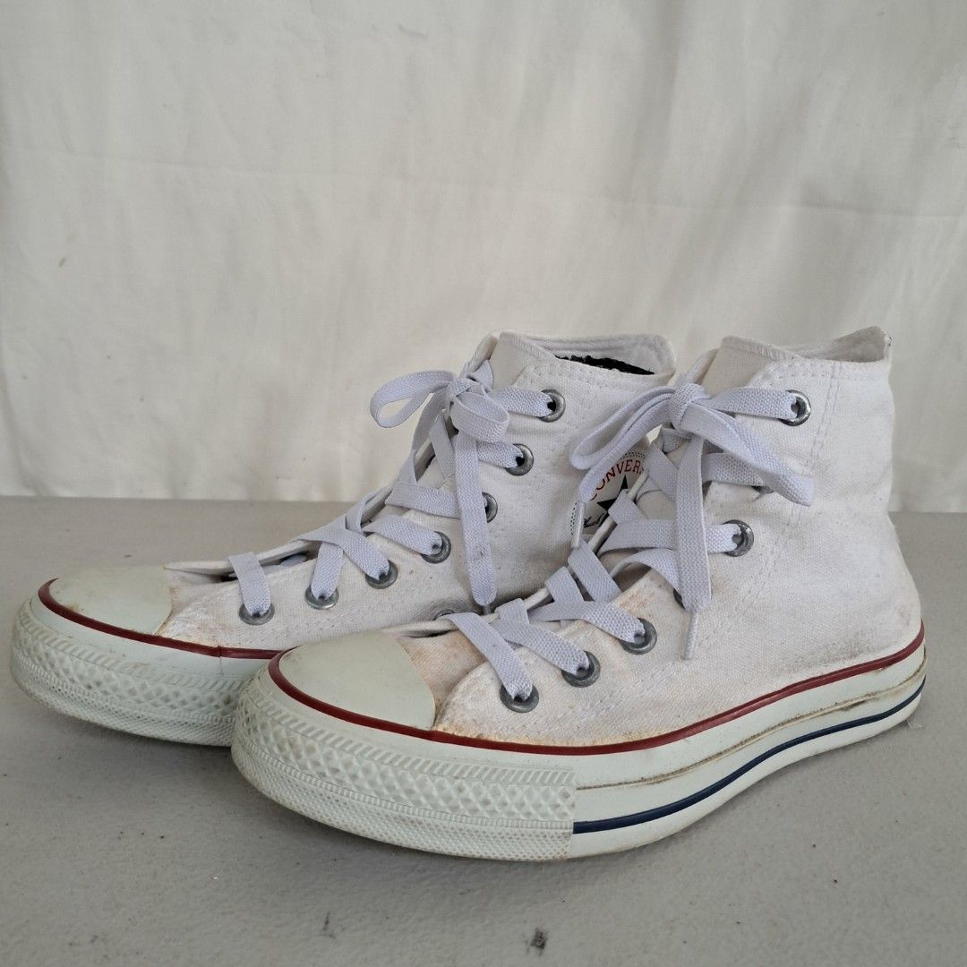 Converse All Star High Top White Canvas Sneakers (Category: Sneakers) located in Bulacan. Submitted by amarijapansurplus (Listing ID 1461432092, Image 3). Description: - US 4.5 / JPN 23.5 - 10" /26cm - classic white Converse high tops - Made of durable canvas material - Shows minor scuffs and dirt marks on soles and toe caps from regular wear - White laces included - Plenty of life left, perfect for everyday casual style.