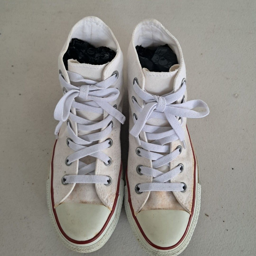 Converse All Star High Top White Canvas Sneakers (Category: Sneakers) located in Bulacan. Submitted by amarijapansurplus (Listing ID 1461432092, Image 1). Description: - US 4.5 / JPN 23.5 - 10" /26cm - classic white Converse high tops - Made of durable canvas material - Shows minor scuffs and dirt marks on soles and toe caps from regular wear - White laces included - Plenty of life left, perfect for everyday casual style.