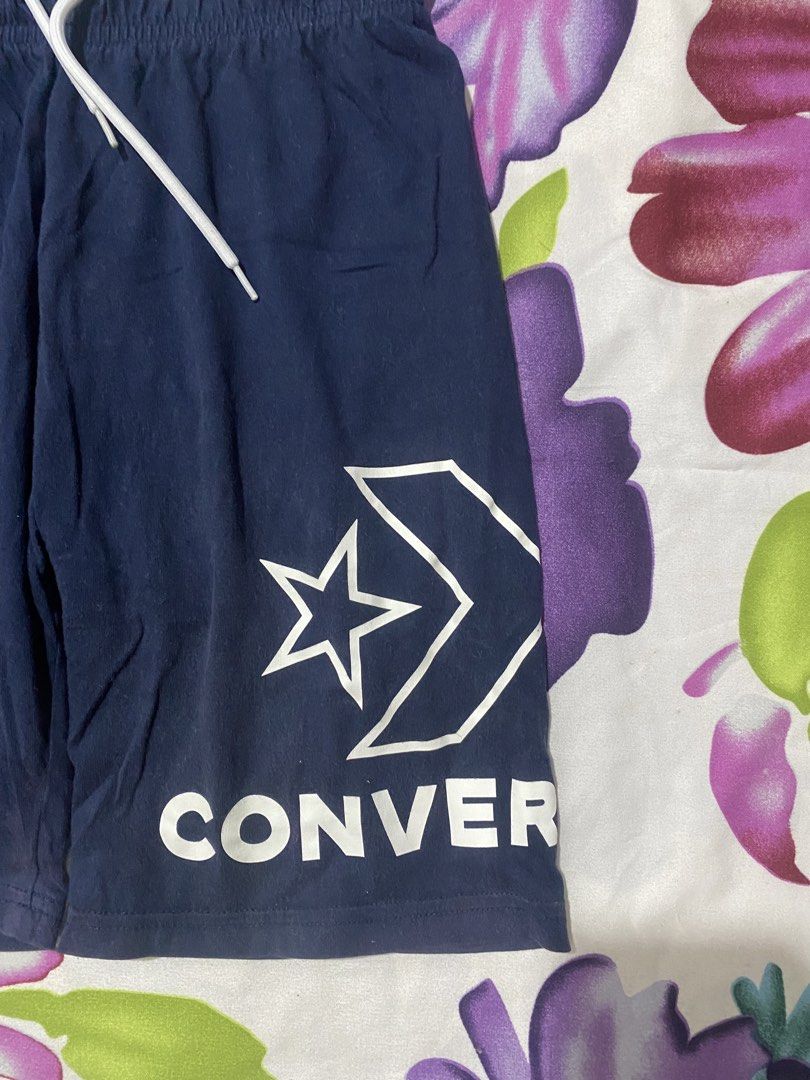 Converse Navy Blue Shorts with Logo Size S (Category: Shorts) located in Las Pinas. Submitted by johnpaul2525 (Listing ID 1461326302, Image 3). Description: - Navy blue Converse shorts - Classic Converse star logo and wordmark - Elastic waistband with drawstring for a comfortable fit - Ideal for casual wear or sports - Size S, fits 140-160cm.