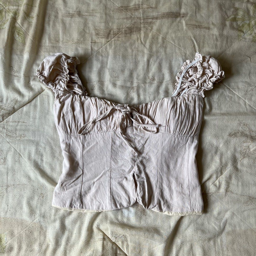 Coquette Top (Category: Others Tops) located in Davao. Submitted by byeooool (Listing ID 1461364780, Image 2). Description: bought in vietnam 10/10 condition, only used once. no flaws actual when worn posted padded best fits xs-s frames soooo flattering!!! 🥹.