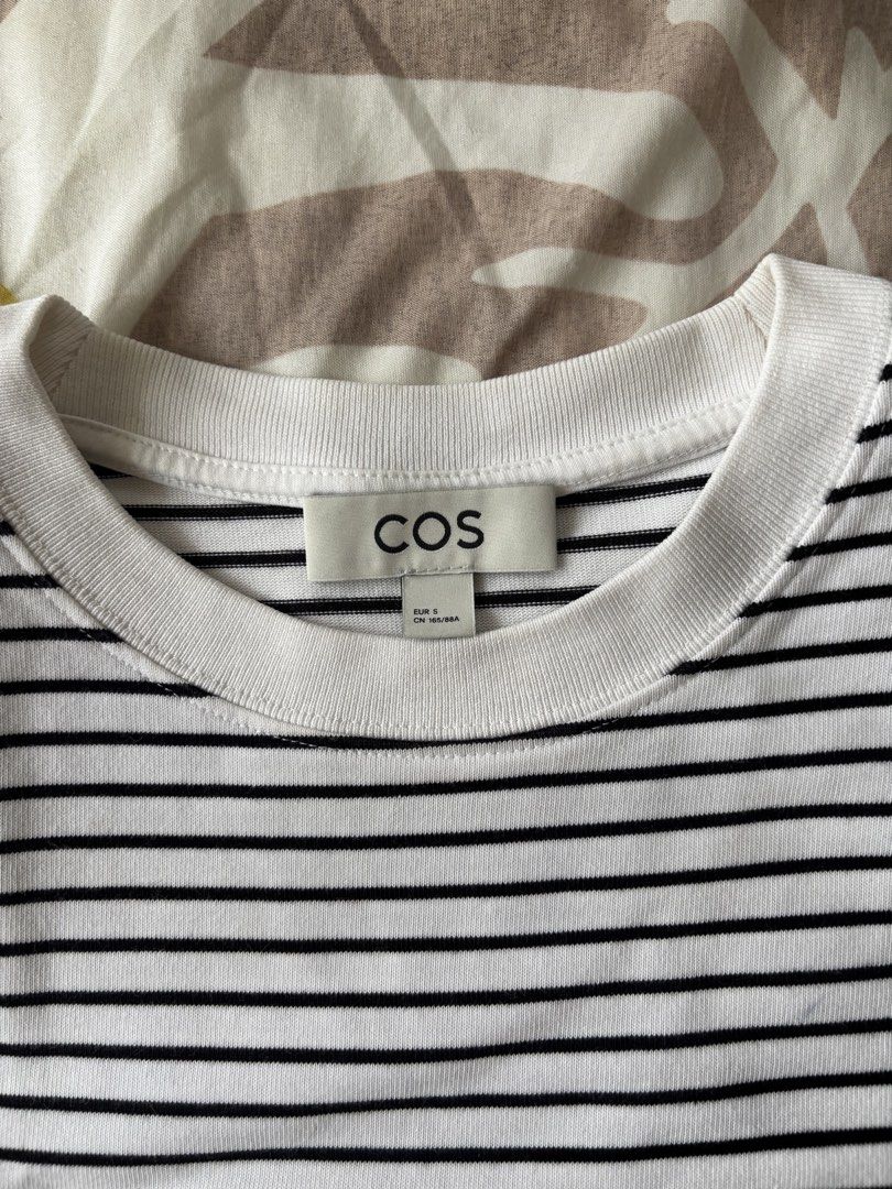COS stripe shirt (Category: Shirts) located in Pasig City. Submitted by pattycakez (Listing ID 1461355287, Image 2). Description: With pinholes hence selling low, thick fabric. .