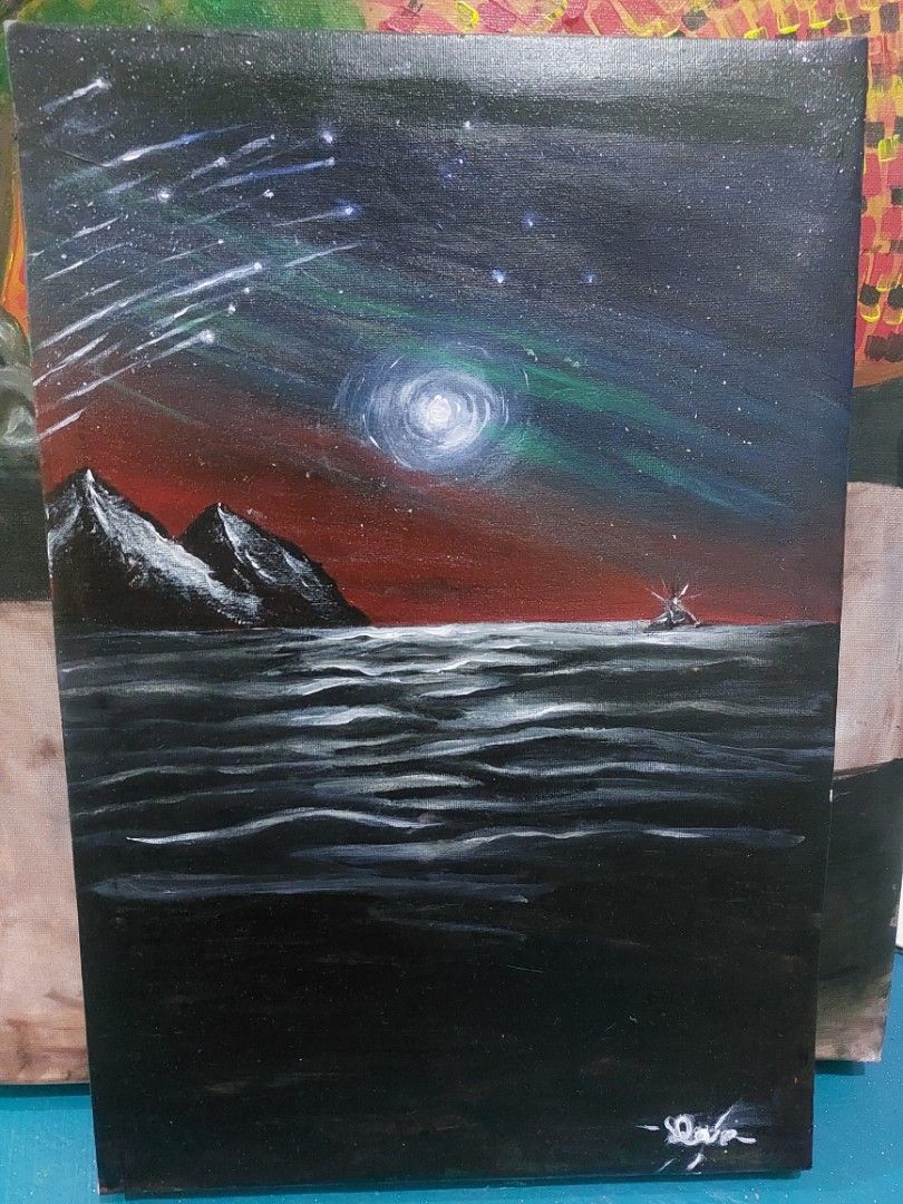 Cosmic Cliffside Painting (Category: Art & Prints) located in Manila. Submitted by liveflower_e4b51c (Listing ID 1461506978, Image 2). Description: - Hand-painted canvas art - Dramatic scene: Starry night sky, aurora, and dark cliff face - Unique blend of space and earth elements - Signed by the artist (top right) - Adds a unique touch to your decor.