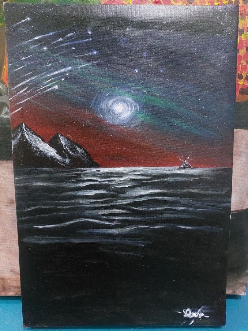 Cosmic Cliffside Painting (Category: Art & Prints) located in Manila. Submitted by liveflower_e4b51c (Listing ID 1461506978, Image 1). Description: - Hand-painted canvas art - Dramatic scene: Starry night sky, aurora, and dark cliff face - Unique blend of space and earth elements - Signed by the artist (top right) - Adds a unique touch to your decor.