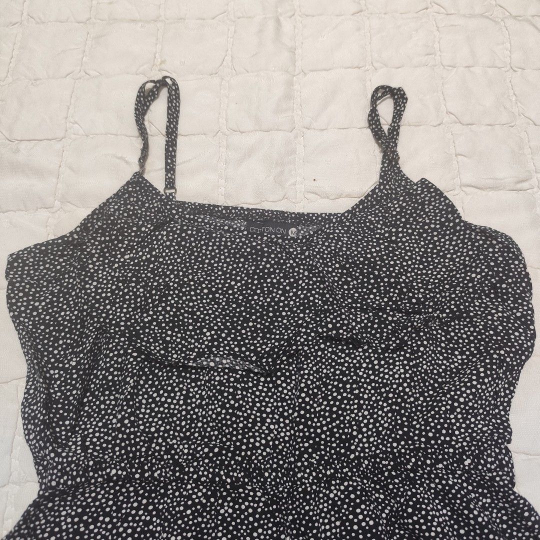 Cotton On Black Dotted Flowy Dress (Category: Dresses) located in Bacolod City. Submitted by dearicawho.56 (Listing ID 1461474032, Image 2). Description: - Cute black mini dress with white polka dots - Adjustable spaghetti straps - Ruffled detail on the bodice - Elasticated waist for a comfortable fit - Made from 100% viscose - Ideal for casual outings or beach days 🧾Mode of payment: 💙Gcash 💚GoTyme 🖤Maya 📍 Bacolod City. Negros Occidental .