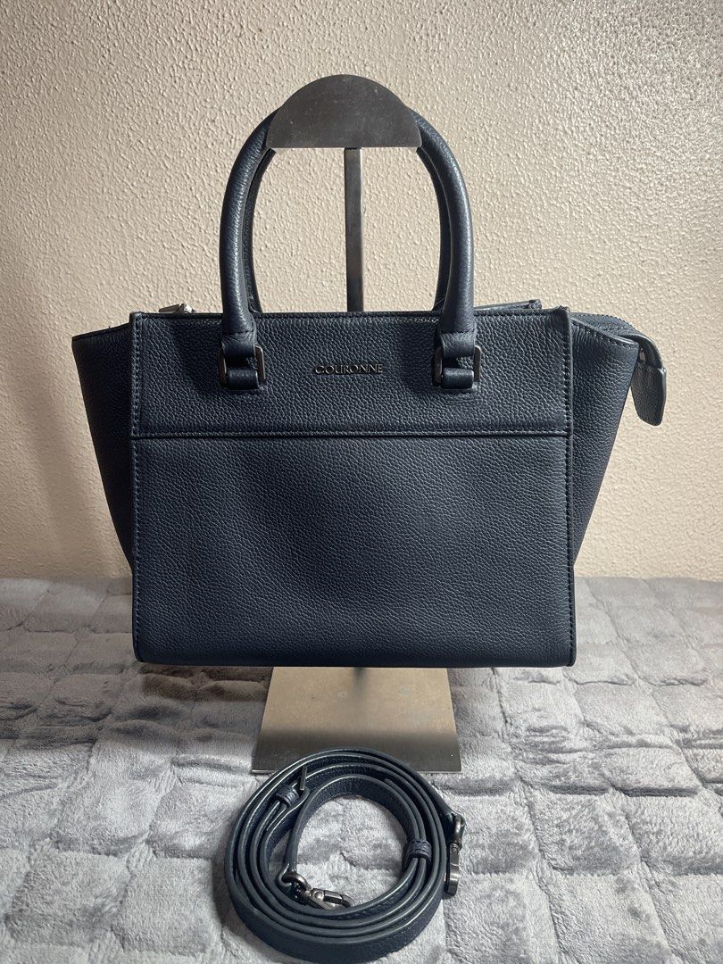 Couronne Navy Pebbled Leather Top Handle Bag with Strap (Category: Luxury Bags & Wallets) located in Quezon City. Submitted by donnabelle7572 (Listing ID 1461394770, Image 1). Description: - Brand: Couronne - Color: Ash Navy Blue - Material: Pebbled Leather - Style: Structured handbag with top handles - Strap: Detachable shoulder strap.