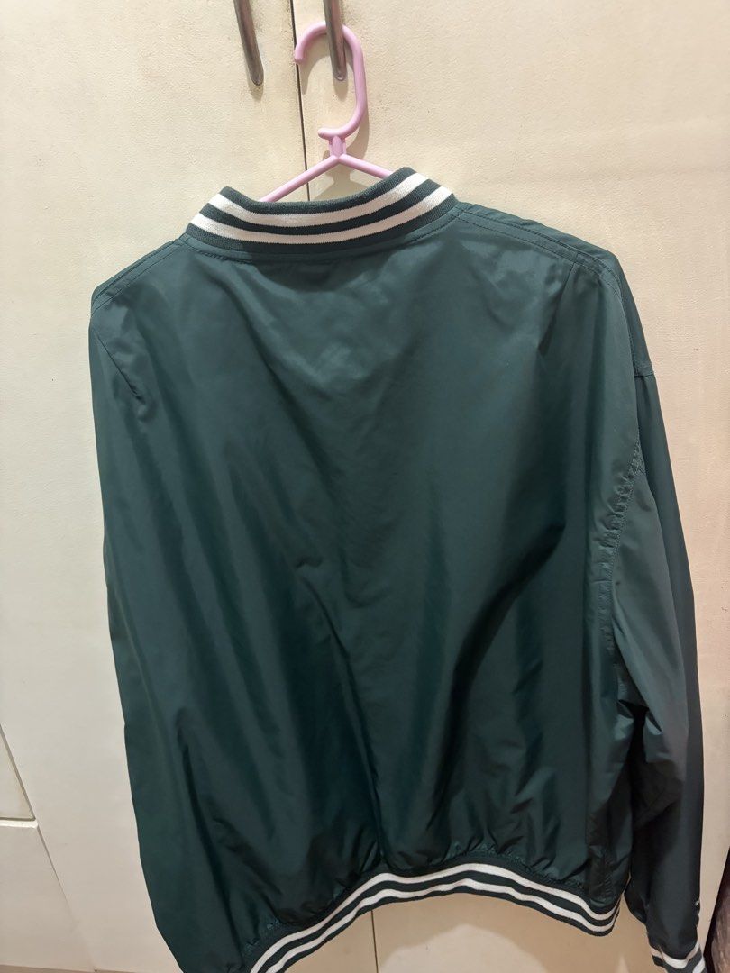 COVERNAT Green Varsity Jacket with 'C' Logo (Category: Coats, Jackets and Outerwear) located in Manila. Submitted by jeonsbit (Listing ID 1461480611, Image 3). Description: - COVERNAT Classic green varsity jacket - White striped collar, cuffs, and hem - White 'C' logo on the chest, covernat on sleeves - Snap button closure - Two front pockets - Bought in Korea -Used Twice.
