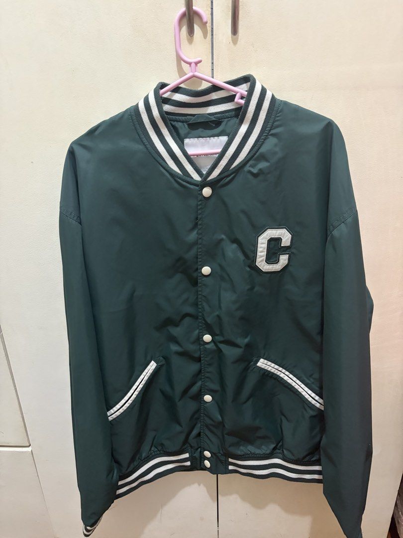COVERNAT Green Varsity Jacket with 'C' Logo (Category: Coats, Jackets and Outerwear) located in Manila. Submitted by jeonsbit (Listing ID 1461480611, Image 2). Description: - COVERNAT Classic green varsity jacket - White striped collar, cuffs, and hem - White 'C' logo on the chest, covernat on sleeves - Snap button closure - Two front pockets - Bought in Korea -Used Twice.