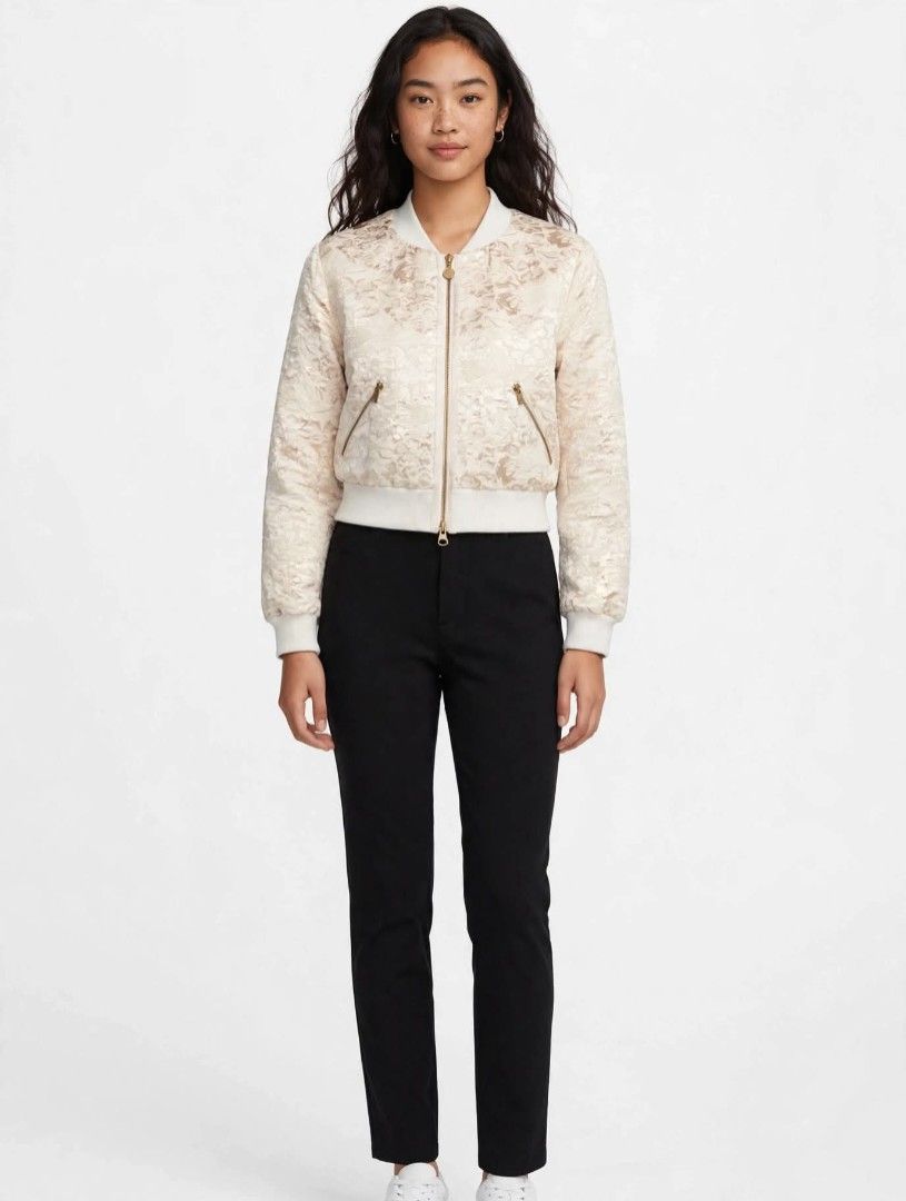 Cream Floral Brocade Bomber Jacket (Category: Coats, Jackets and Outerwear) located in Manila. Submitted by tinygazo90639 (Listing ID 1460761638, Image 1). Description: - Cream bomber jacket with a beautiful floral brocade pattern. - Features a zip-up front. - Two zip pockets on the sides. - Ribbed collar, cuffs, and hem for a snug fit. - Cropped style, ideal for layering over outfits. - Adds a touch of elegance and texture to any look..