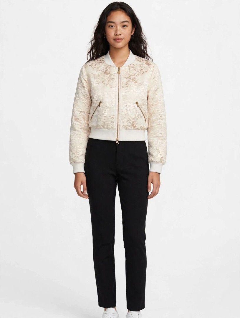 Cream Floral Brocade Bomber Jacket (Category: Coats, Jackets and Outerwear) located in Manila. Submitted by tinygazo90639 (Listing ID 1460761638, Image 2). Description: - Cream bomber jacket with a beautiful floral brocade pattern. - Features a zip-up front. - Two zip pockets on the sides. - Ribbed collar, cuffs, and hem for a snug fit. - Cropped style, ideal for layering over outfits. - Adds a touch of elegance and texture to any look..