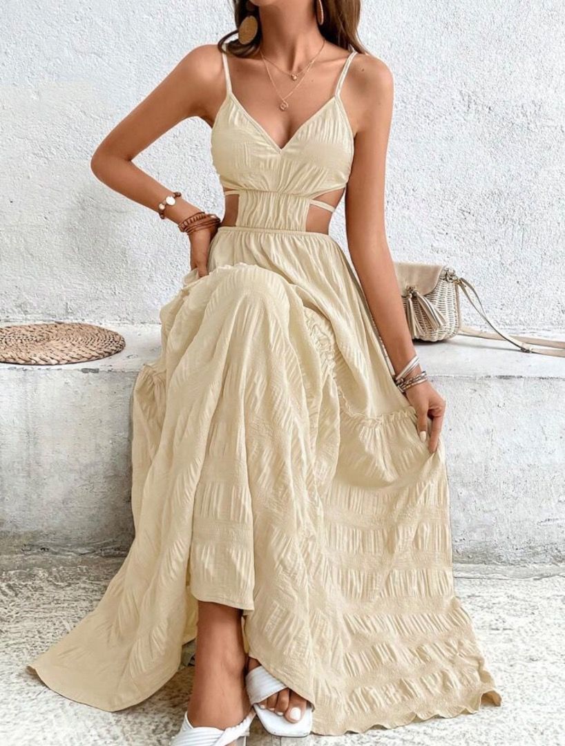Cream Textured Tie-Back Maxi Dress (Category: Dresses) located in Manila. Submitted by vybeandstyleco (Listing ID 1461521705, Image 2). Description: - Cream colored maxi dress - Textured fabric - Open back with tie-back detail - Tiered skirt with ruffled hem - Spaghetti straps - Ideal for beach vacations or summer outings.