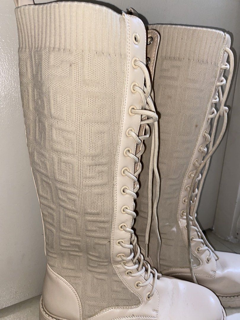 Cream-colored knee-high lace-up boots (Category: Dress Shoes) located in Manila. Submitted by labrhinth (Listing ID 1461525164, Image 3). Description: I can go lower for sure buyers All parts intact Minimal dirts but cleanable with wipes Size 38 but can fit well with 37-39 Can do meet up and lalamove.