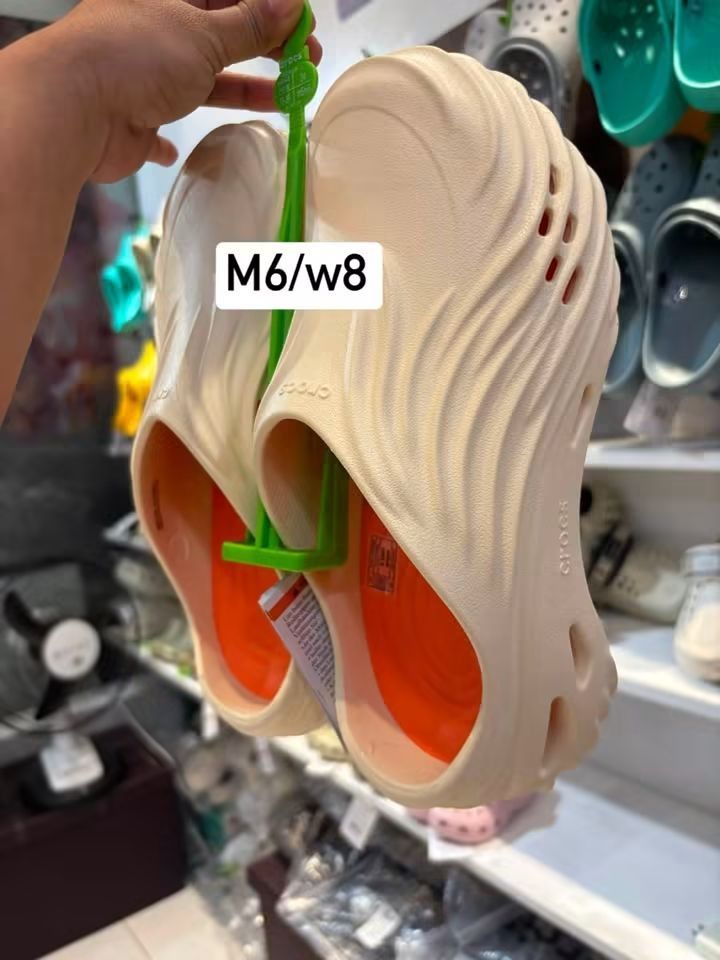 Crocs Echo Clog Sandals - Various Sizes & Colors Available (Category: Slippers & Slides) located in Cebu City. Submitted by madeskartegirl (Listing ID 1461337933, Image 3). Description: - Crocs Echo Clogs - Available Sizes & Colors: - White: M7/W9 - Dark Grey: M8/W10 - Beige: M6/W8 - Light Grey: M6/W8 - Unique wavy design - Comfortable and stylish - Perfect for everyday wear.