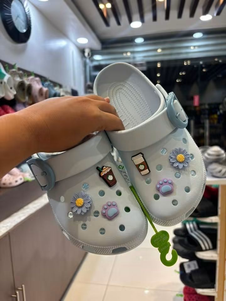 Crocs with Charms - Light Blue, Beige, Pink (Category: Slippers and slides) located in Cebu City. Submitted by madeskartegirl (Listing ID 1461337700, Image 1). Description: - Adorable Crocs with fun, interchangeable charms. - Available colors: Light Blue, Beige, Pink. - Super comfortable and easy to slip on/off. - Ideal for kids and everyday casual wear..