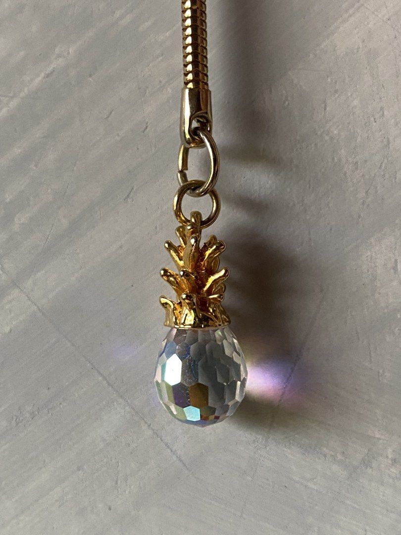 Crystal Pineapple Keychain (Category: Other Accessories) located in Cebu City. Submitted by janb85 (Listing ID 1461427497, Image 2). Description: Faceted crystal pineapple keychain Gold tone Very cute .