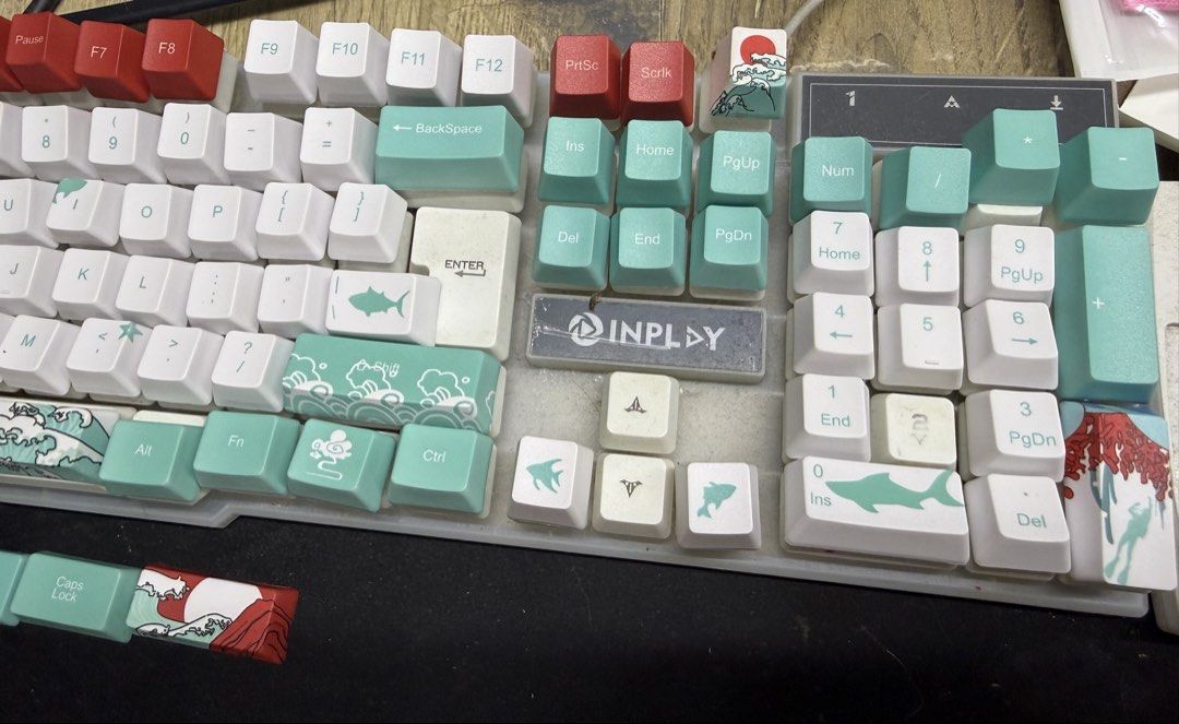 Custom Mechanical Keyboard Keycaps - Japanese Wave (Category: Computer Keyboard) located in Angeles City. Submitted by hyegastos (Listing ID 1461362213, Image 2). Description: - Custom keycap set featuring a cool Japanese wave and koi fish design. - For mechanical keyboard (first pic can be used for reference since there are missing keycaps) - High-quality keycaps with a nice texture and awesome look. - Please note: This is for keycaps only, not 