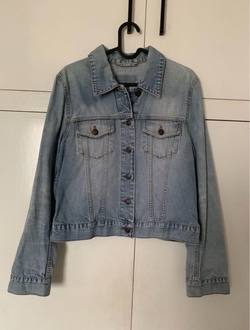 Customized Denim Jacket with Hand-Painted Art and Patches (Category: Coats, Jackets and Outerwear) located in Quezon City. Submitted by artsymabel (Listing ID 1461338203, Image 2). Description: - Light wash denim jacket - Hand-painted portrait on back - Embroidered bee patches - Floral appliqués - Beaded 'loved' detail above artwork - Buttoned cuffs on sleeves - Unique statement piece.
