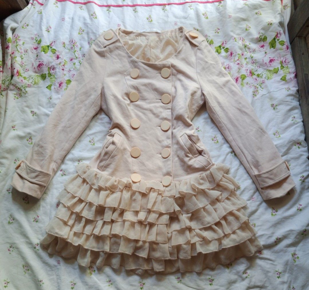 Cute Ruffled Hem Double-Breasted Coat (Category: Coats, Jackets and Outerwear) located in Kalibo. Submitted by choirandoms (Listing ID 1461501053, Image 1). Description: FREE SHIPPING - Light pink double-breasted coat - Ruffled hem with sheer fabric layers - Button details on front and shoulders - Cuffed sleeves with button accents - Front pockets - Creates a sweet, feminine look.