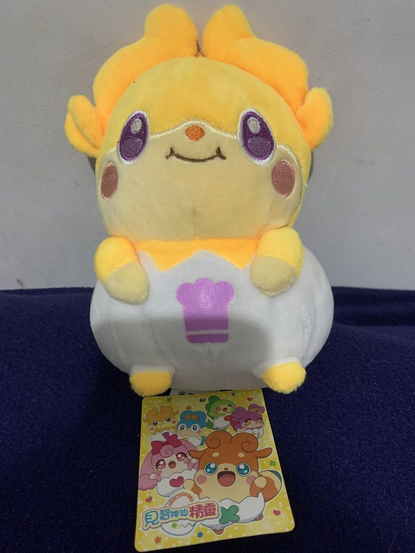 Cute Yellow Plush Toy with Tag (Category: Plushies & Soft Toys) located in Pasig City. Submitted by miswatamita (Listing ID 1461405704, Image 1). Description: - Adorable yellow plush toy - Features purple eyes and a white body - Cute chef hat design on the front - Includes original tag with other characters - Ideal for collectors or as a thoughtful gift.